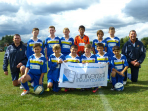 YOUTH FOOTBALL TEAM STRIKES ‘SMART’ DEAL!